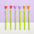 Bluebells Wiggle Gel Pen set with green stems and colorful flower tops featuring tiny animal critters in bluebell shapes.