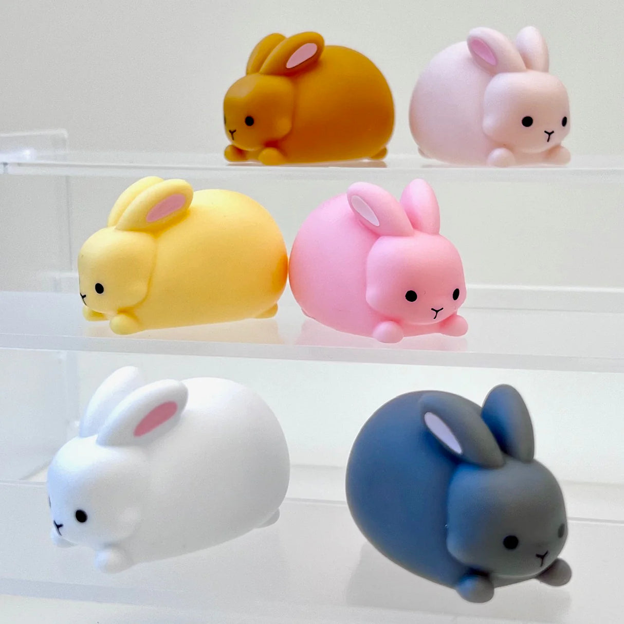 Rabbit Figurine set of colorful 2-inch miniature rabbits made with care, perfect for ages 3 and up.