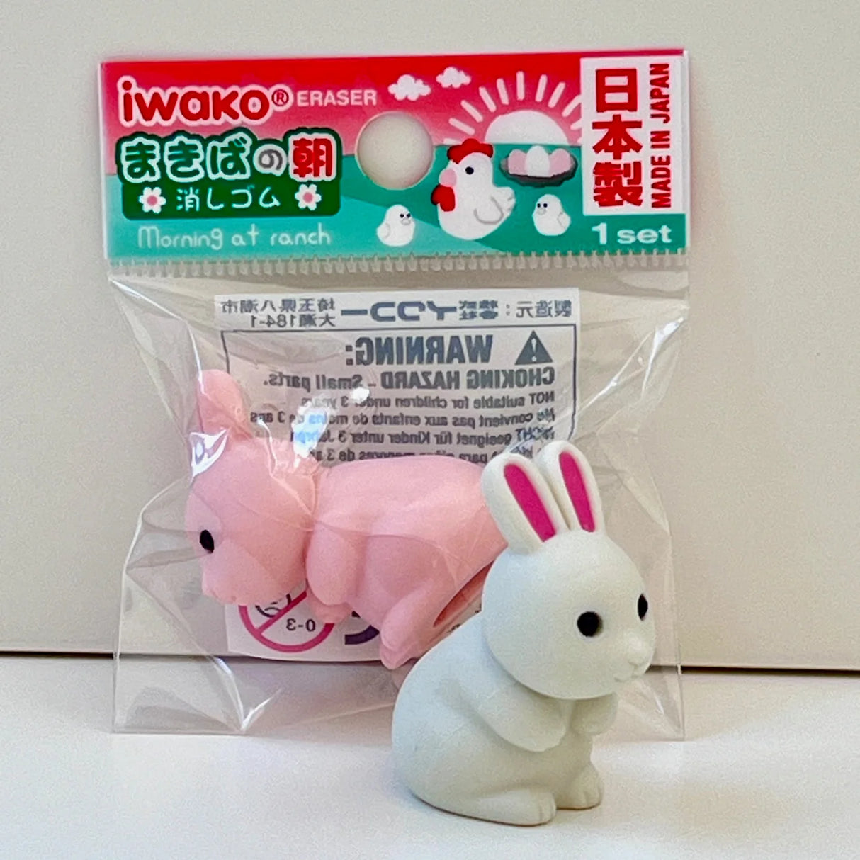 Japanese Eraser Chicken & Friends set featuring cute pink pig and white bunny erasers in original packaging.