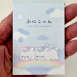 Mini Notepad | Unicorn Funi with pastel unicorns on clouds and rainbow, full-color pages, petit art size.