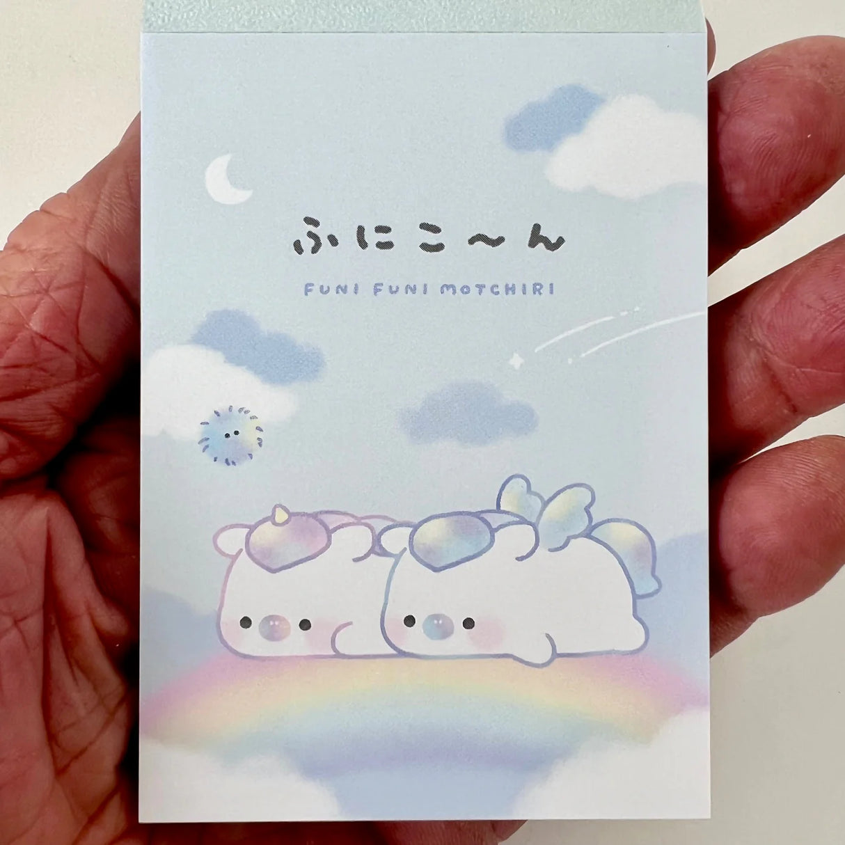 Mini Notepad | Unicorn Funi with pastel unicorns on clouds and rainbow, full-color pages, petit art size.