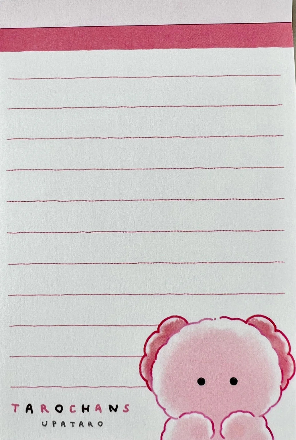 Mini Notepad | Axolotl Wooper Looper with pink lined pages and cute cartoon character design by CRUX.