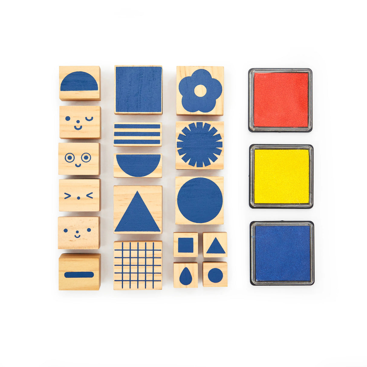 Make, Create & Play Stamp It! Set with 18 wooden stamps featuring shapes and faces, plus 3 washable ink pads in red, yellow, blue.