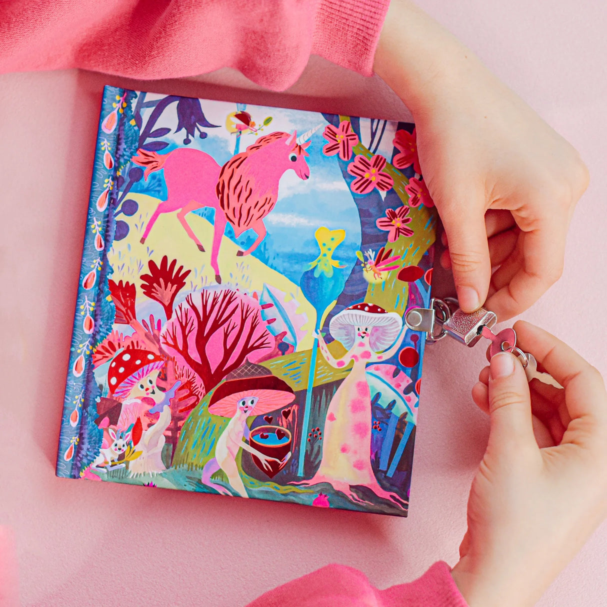 Magical Creatures Diary with colorful unicorn design, foil cover, lock and keys, perfect for creative journaling.