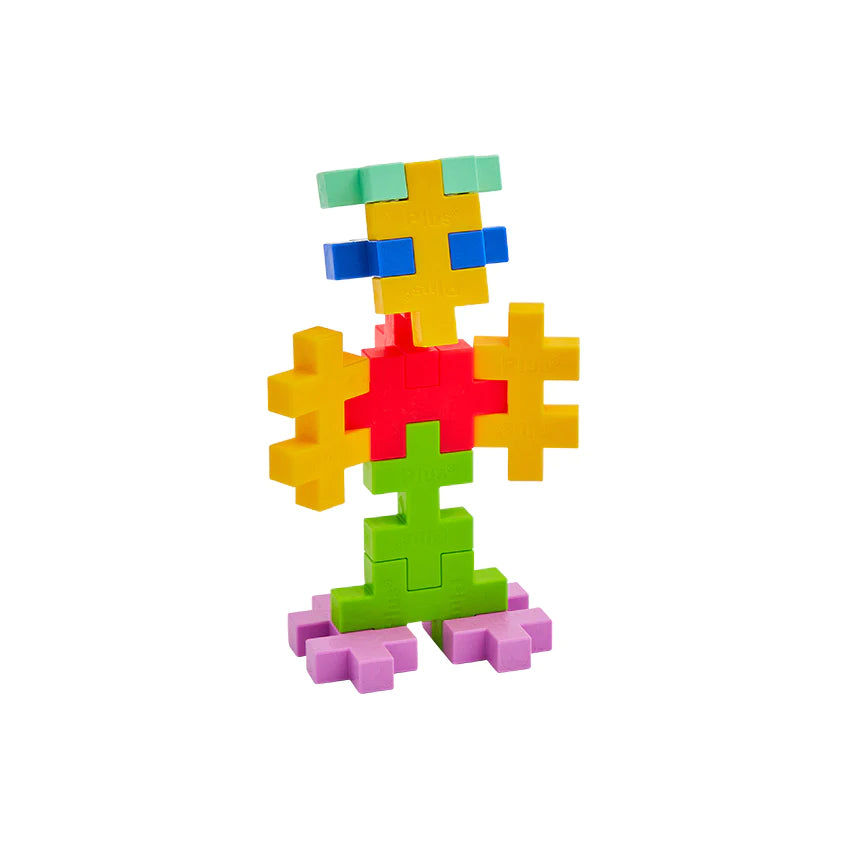 Plus-Plus BIG 15pc Tropical colorful toy pieces assembled into a playful 3D figure on white background