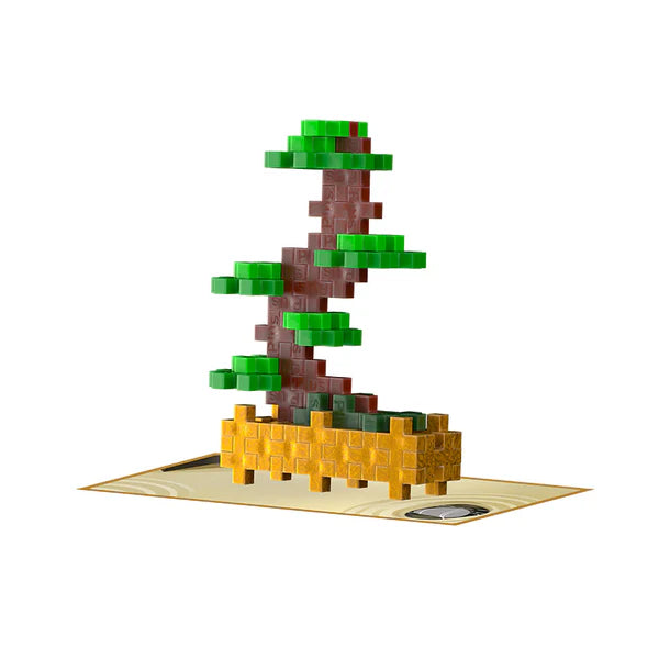 Plus Plus Playful Plant Packet featuring a buildable bonsai tree on a themed display mat for creative play.
