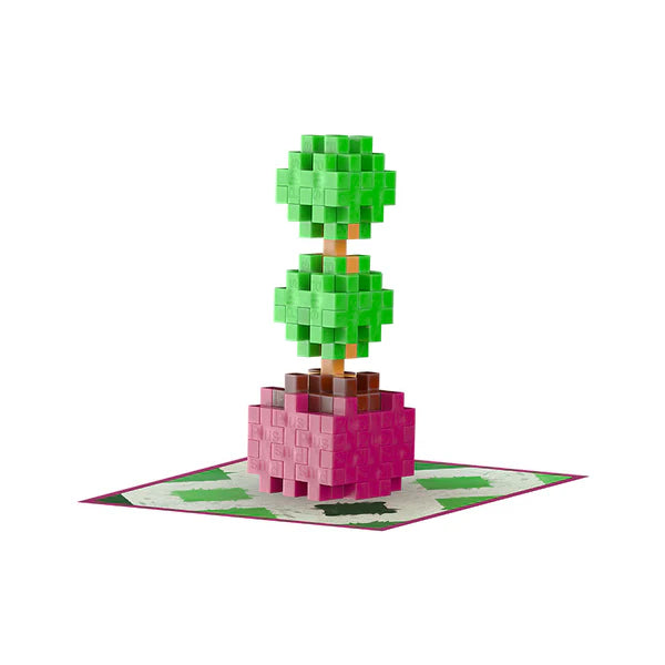 Plus Plus Playful Plant Packet showing a green block bonsai tree on a decorative mat for creative building fun.