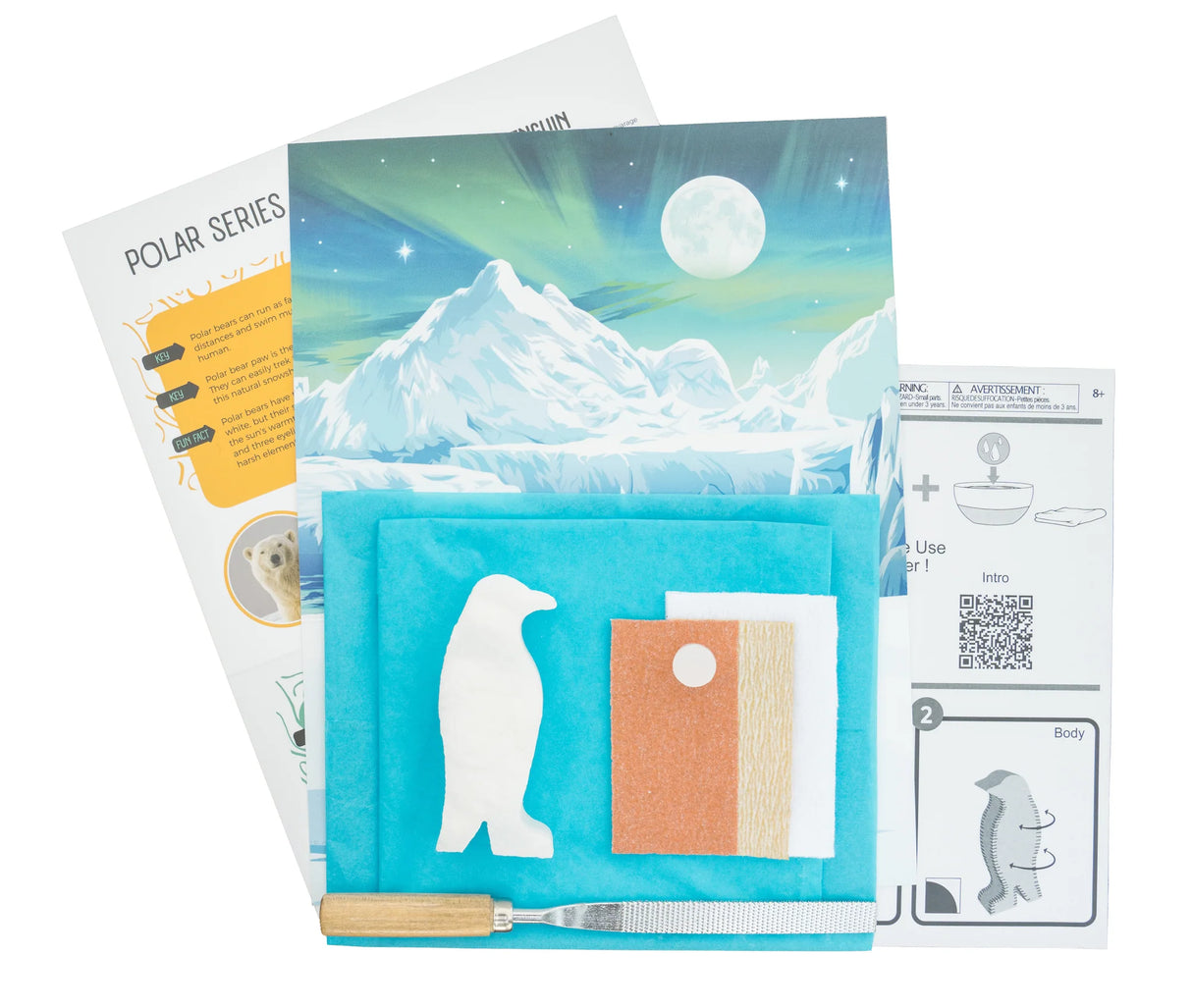 Soapstone Carving Kit | Penguin with alabaster stone, carving tools, instructions, and polar-themed fold-up diorama.