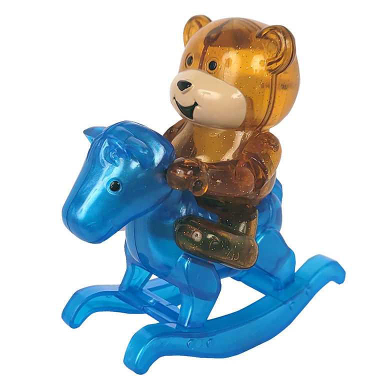 Z Wind Ups | Rocking Bear Ricky toy with brown bear riding a translucent blue rocking horse, wind-up action.