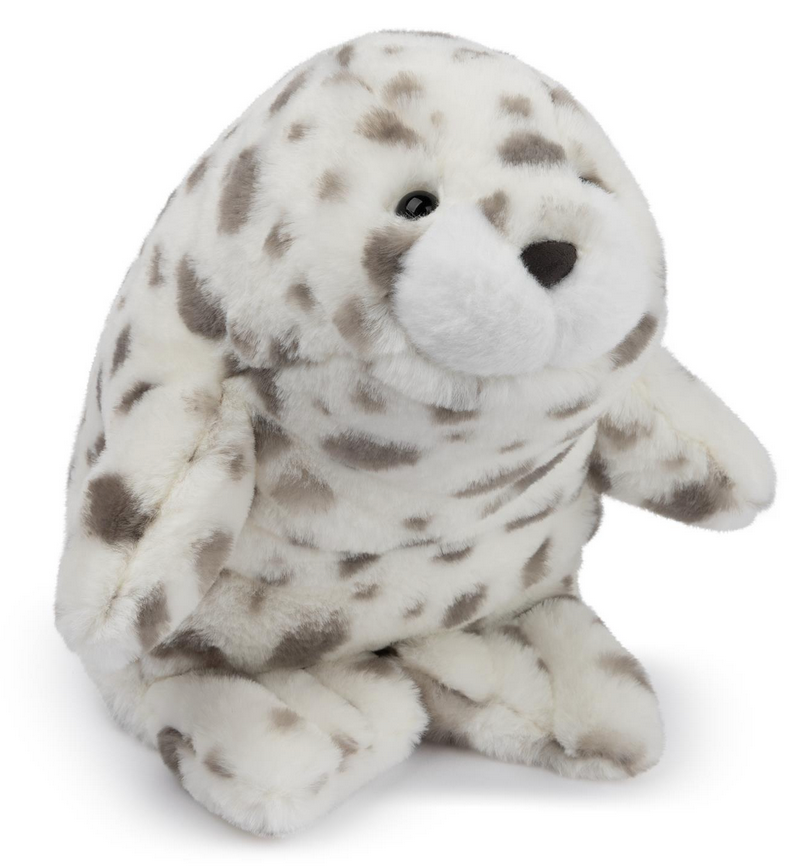 Snuffles Leopard Seal Nuri plush toy with soft white and gray spots and a sweet smiling face.