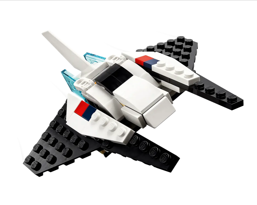 Creator Space Shuttle toy built with black and white interlocking bricks featuring blue and red accents.