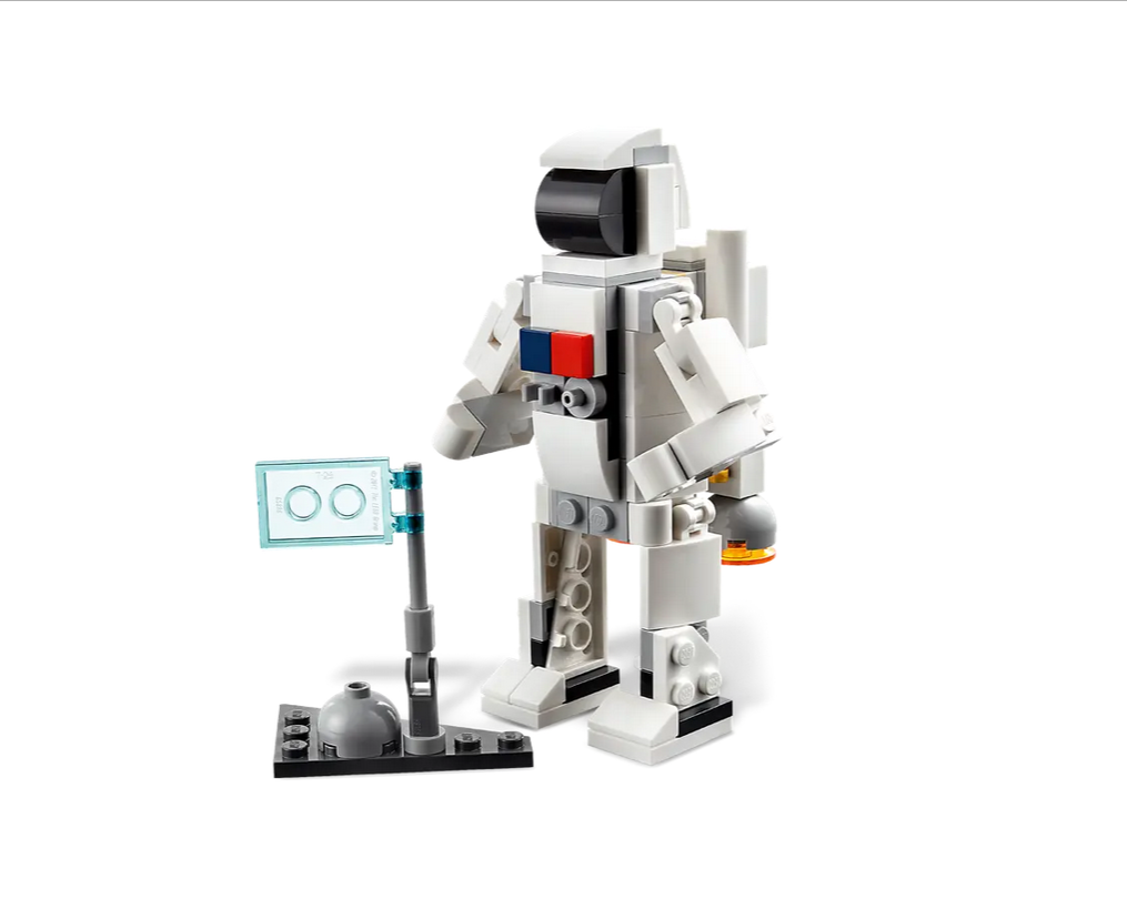 Creator Space Shuttle toy model with astronaut figure and flag, detailed white space exploration design.