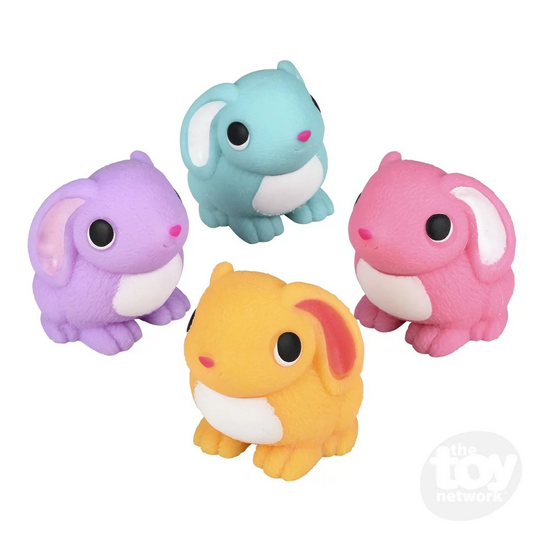 Four colorful Squish & Stretch Bunny silicone toys in purple, blue, pink, and yellow for stress relief and fidgeting.