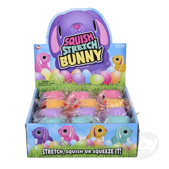 Assorted colorful Squish & Stretch Bunny silicone toys in display box for fidgeting and stress relief, ages 3 and up.