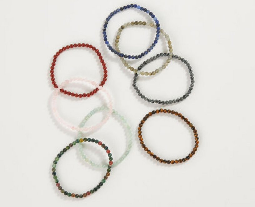 Mini Crystal Bracelet collection featuring assorted colorful genuine mini crystal beads on elastic cords.