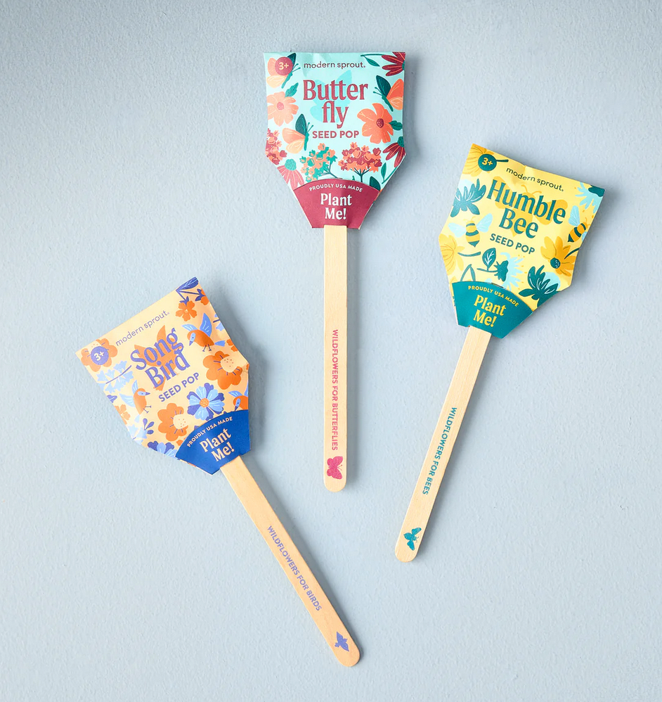 Pollinator Seed Pop featuring Butterfly, Humble Bee, and Song Bird wildflower seed starters with planting sticks.