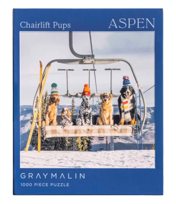 1000pc Chairlift Pups Aspen Puzzle featuring dogs riding a snowy ski lift