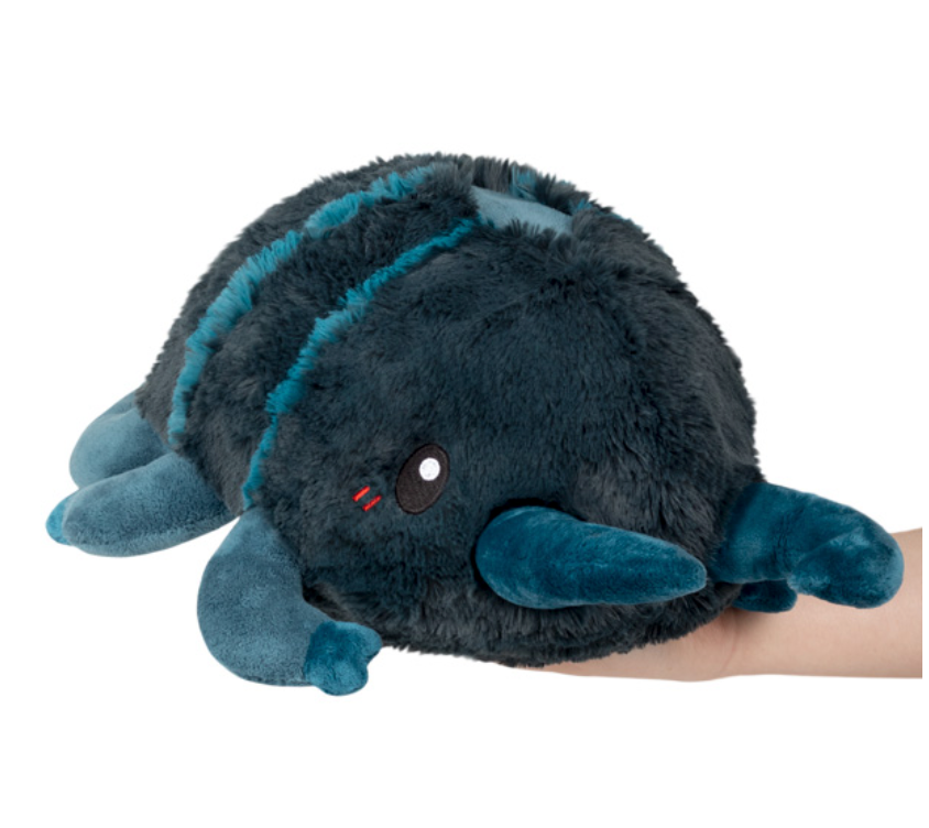 Stag Beetle Mini plush toy in dark blue held in hand, soft polyester fiber for all ages.