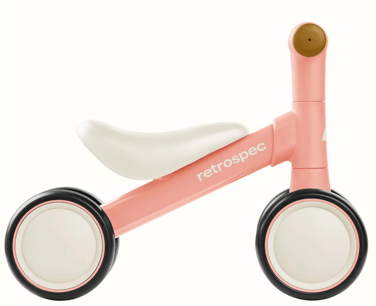 Cricket 2 Baby Walker Balance Bike in baby pink with no-scratch wheels, 135° limit steering, perfect for indoor use.