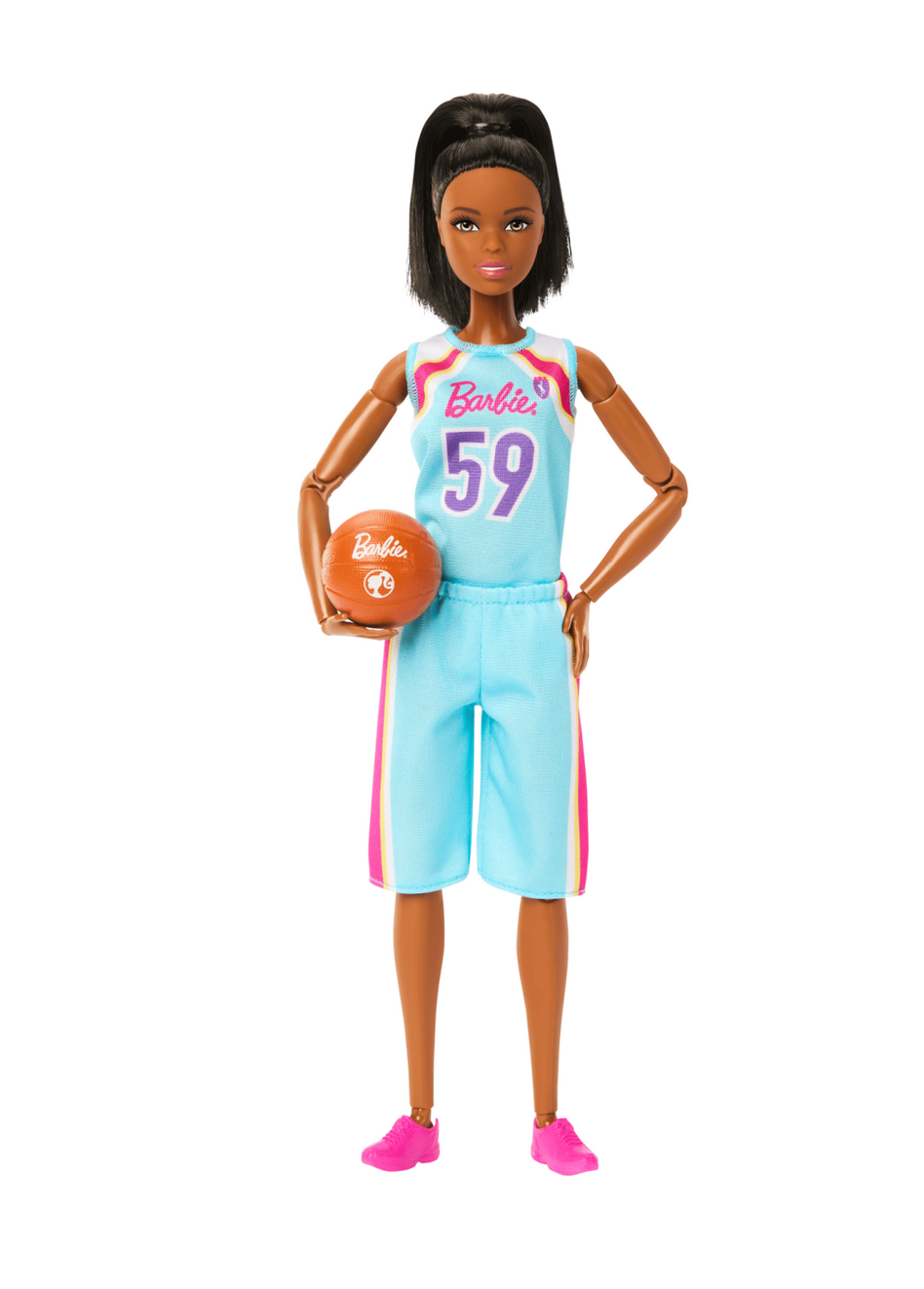 Barbie Made to Move Basketball doll in blue uniform holding basketball, designed with 22 flexible joints for action poses.