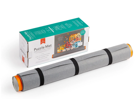 Puzzle Mat with non-slip felt, elastic straps, and cardboard cylinder for storing and preserving puzzles in progress.