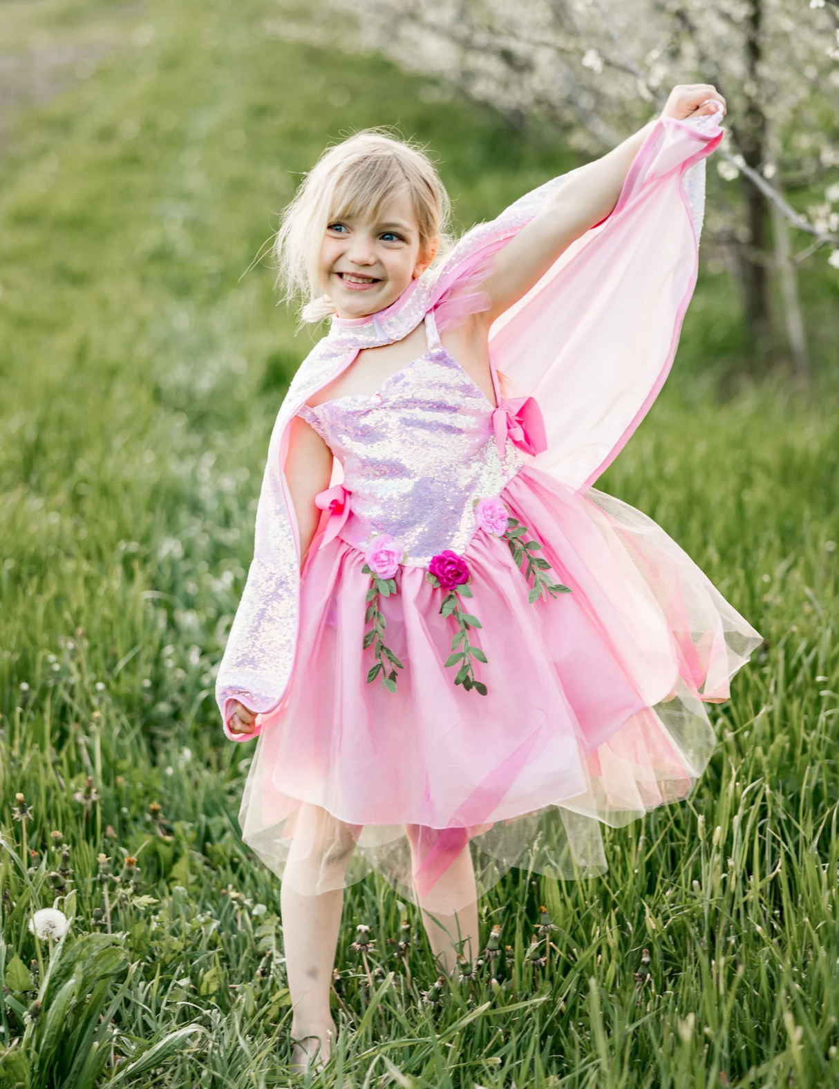 Girl outdoors wearing Pink Sequins Fairy Tunic | Size 3-4 with shimmering sequins and floral accents.