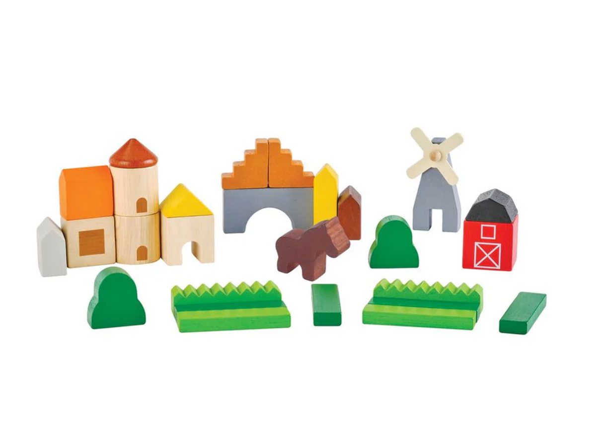 Country Blocks wooden farm-themed blocks set with animals, barns, and windmill for creative countryside play.