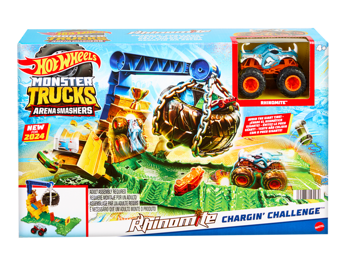 Hot Wheels Monster Trucks Rhinomite Chargin Challenge with tire trap, crushed cars, and 1:64 scale Rhinomite truck playset.