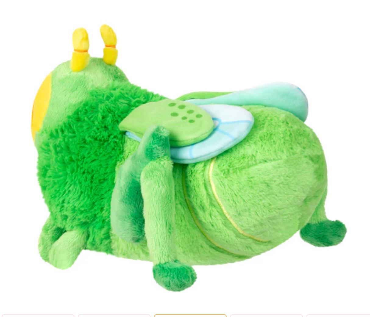 Soft green plush bug toy with yellow antennae and light blue wings called Grasshopper Mini, friendly for all ages.