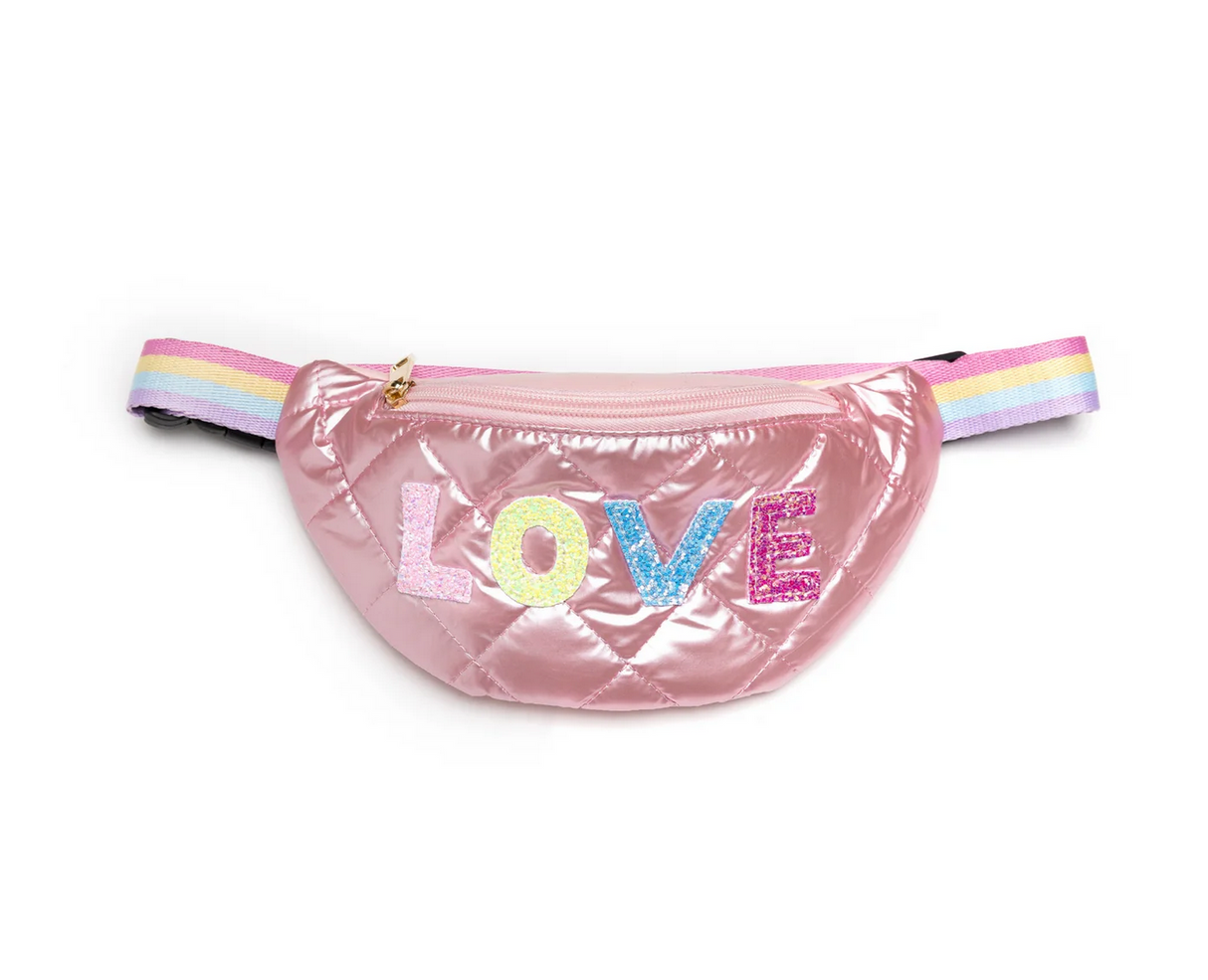 Plushie Love Fanny Pack in shiny pink with colorful LOVE letters and adjustable rainbow strap for kids' essentials.