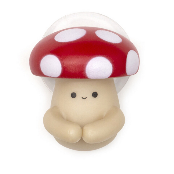 Toothbrush Holder | Mushroom with smiling face design and suction cup for organizing toothbrushes on smooth surfaces.