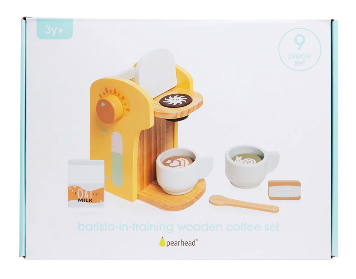 Barista in Training Wooden Coffee Set with wooden coffee maker, two cups, spoon, oat milk carton, sugar pack, and coffee pods.