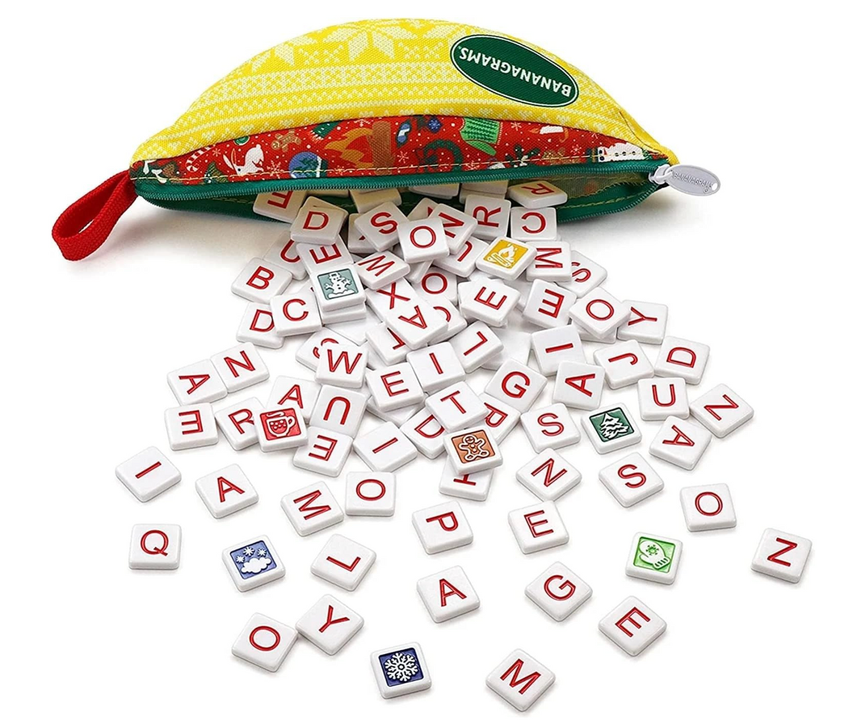 Bananagrams | Winter Wonderland tiles scattered from a festive yellow pouch showing holiday-themed bonus tiles.
