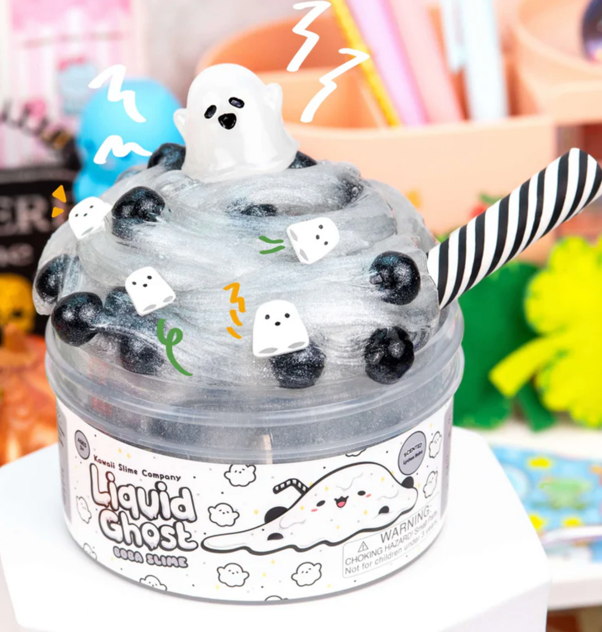 Liquid Ghost Boba Clear Slime with iridescent texture, black boba pearls, ghost charm, and striped pretend straw.