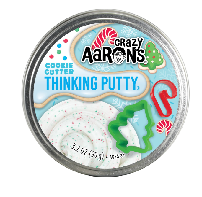 Holiday Cookie Cutter Thinking Putty with red and green glitter and two festive cookie cutters in a tin.