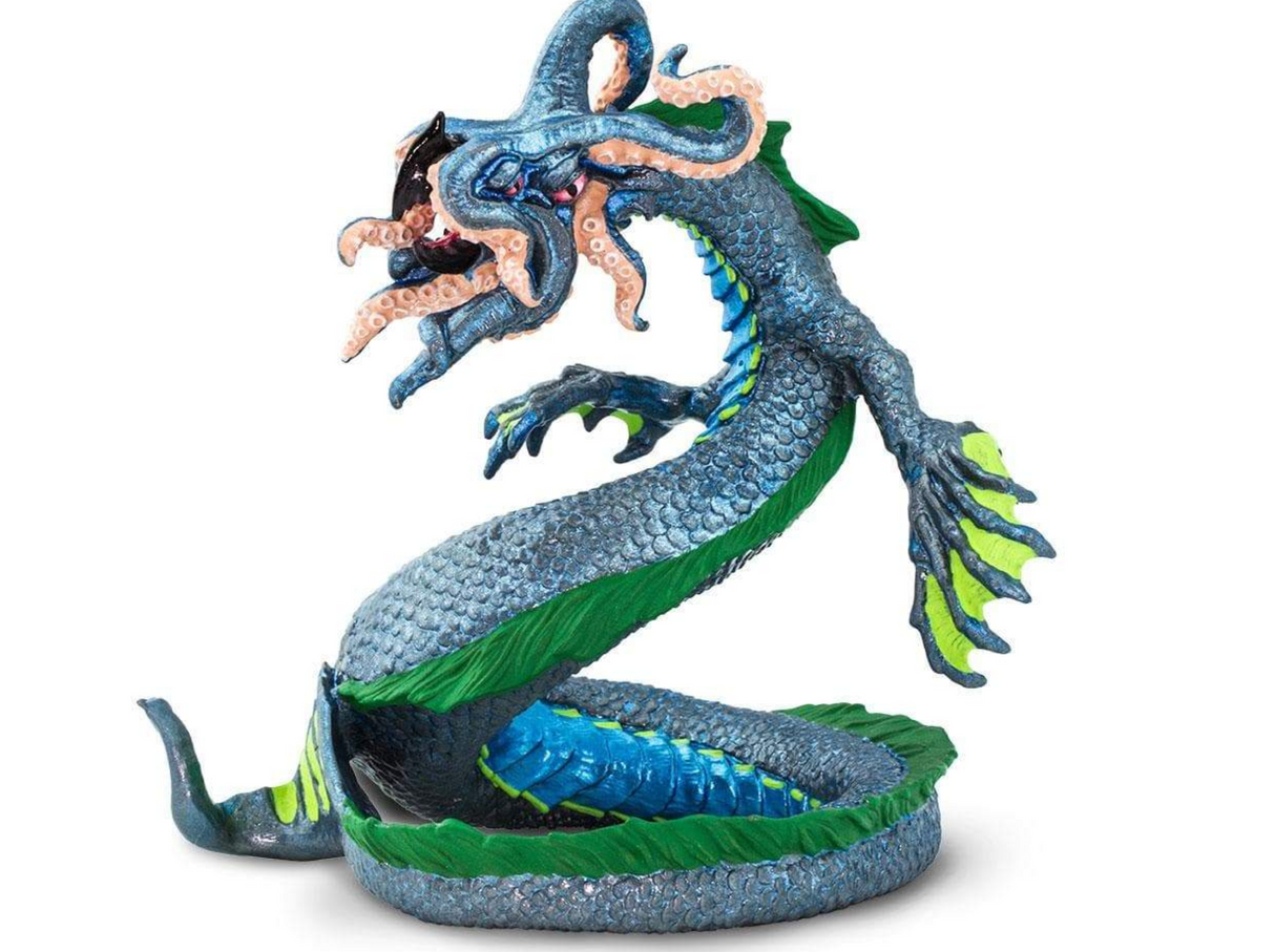 Leviathan figurine with coiled body, four-eyed squid-like face, tentacles, and detailed scales ready to strike.