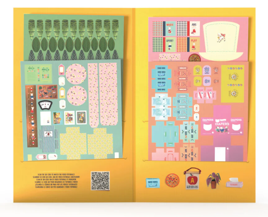 Sam & Julia | Diecuts: Nursery showing colorful paper sheets with miniature nursery items for kids’ bedroom decoration.