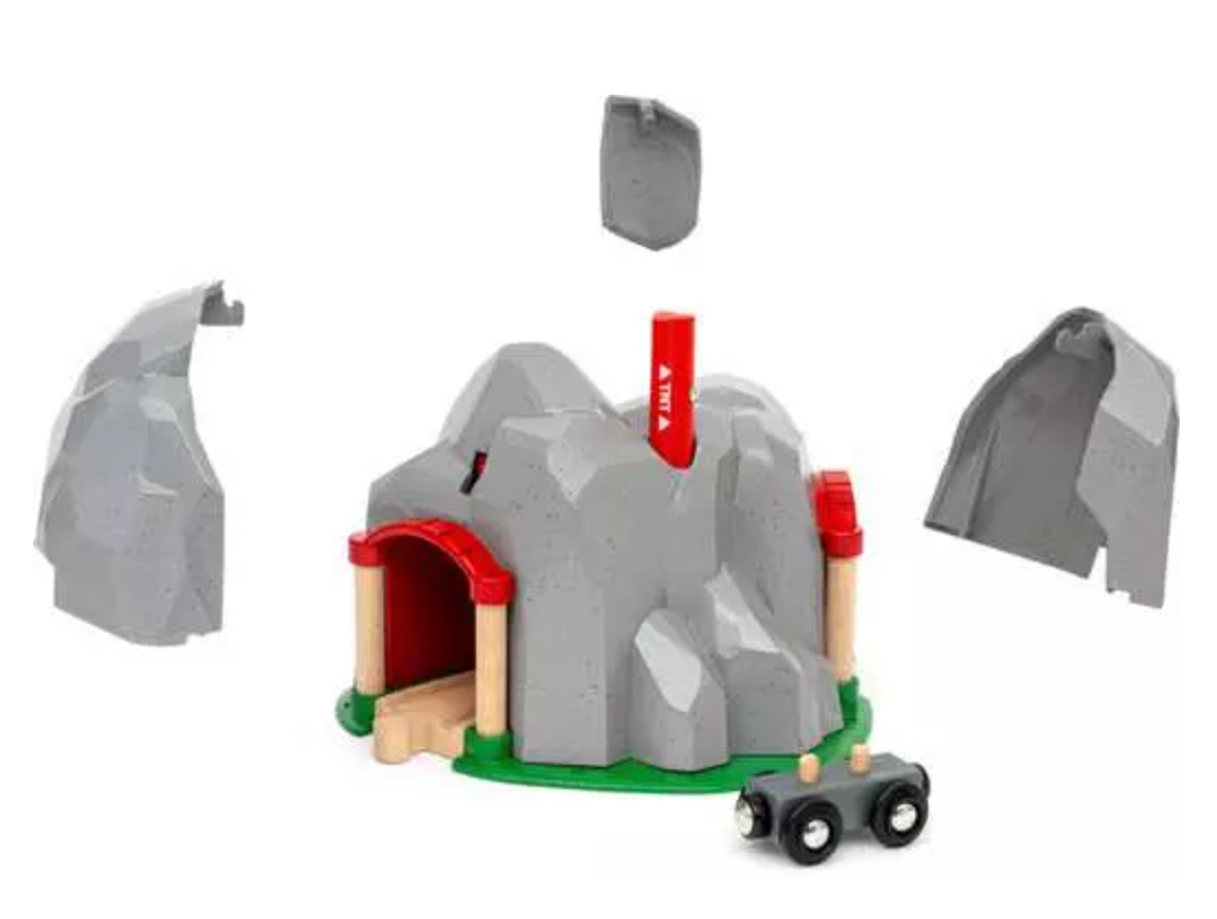 Dynamite Mountain Tunnel toy showing stone mountain parts, red TNT, and black train for BRIO World sets.