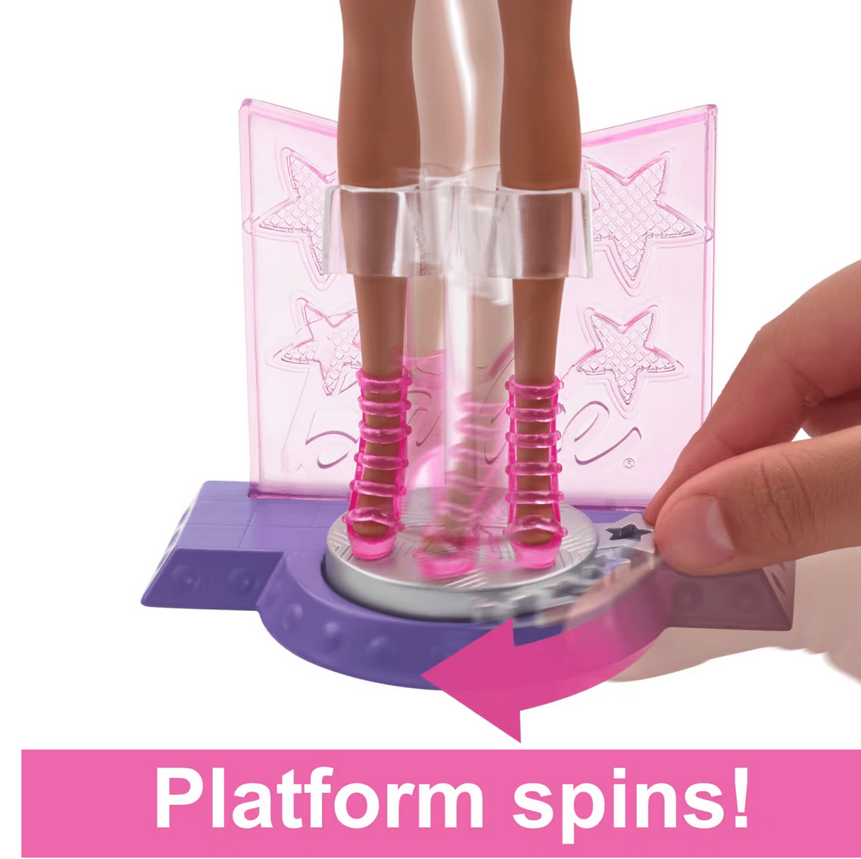 Barbie Pop Star Playset showing doll standing on rotating purple and silver spinning stage platform.
