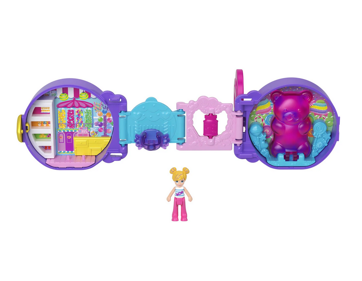 Polly Pocket On the Go Fun compact open showing candy shop playset with doll and moving bear feature.