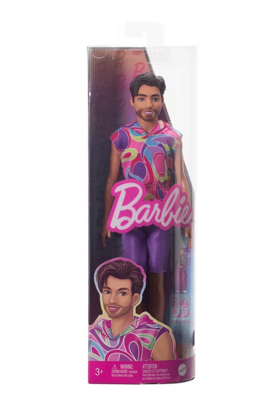 Barbie Fashionista Ken doll wearing colorful graphic hoodie and purple shorts in clear packaging for ages 3 and up.