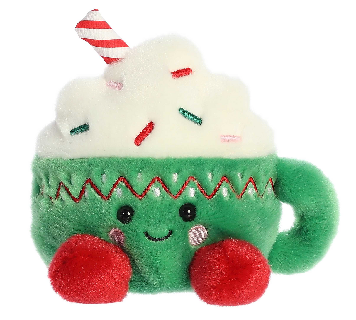 Palm Pals Hot Cocoa Candace plush green mug with whipped cream, colorful sprinkles, red and white striped straw, and smiling face.