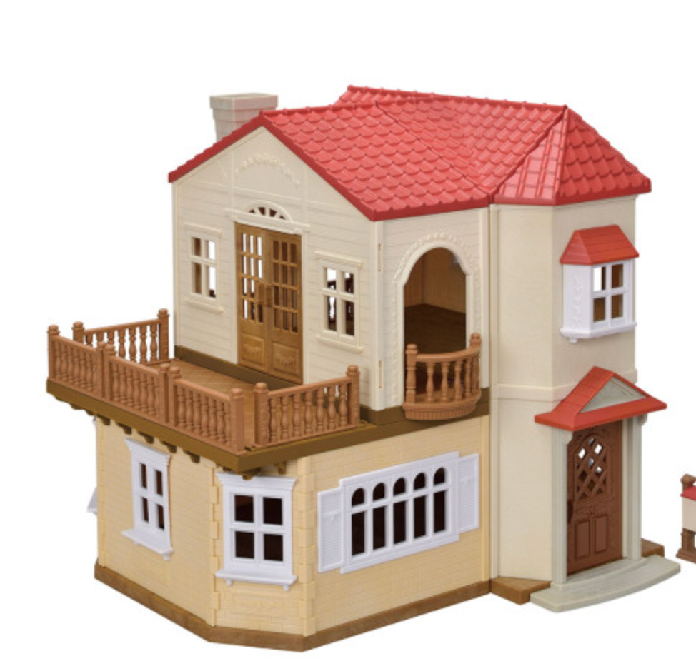 Red Roof Country Home dollhouse with red roof, beige walls, balcony, and multiple windows for imaginative play.