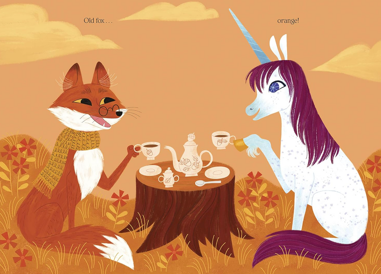 Uni Paints a Rainbow shows a unicorn and fox sharing tea in an autumn forest scene with warm orange tones.