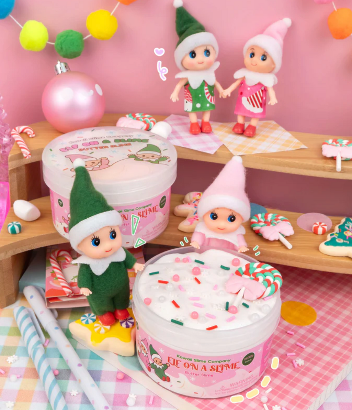 Elf on a Slime Butter Slime with baby elf charms and festive sprinkles in a colorful holiday setting.