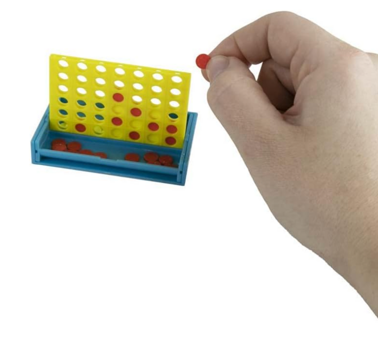 Hand placing red token in the World's Smallest Connect 4 miniature game with blue base and yellow grid.