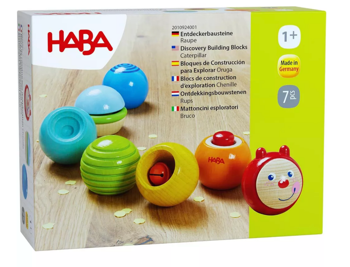 Discovery Building Blocks Caterpillar wooden toy with colorful, textured pieces for sensory play and early learning.