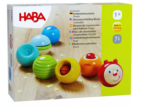 Discovery Building Blocks Caterpillar wooden toy with colorful, textured pieces for sensory play and early learning.