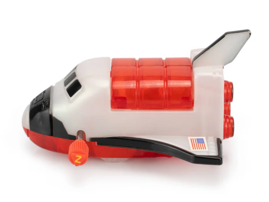 Z Wind Ups | Space Shuttle Moony wind-up toy with opening cargo bay and astronaut figure on a white background.