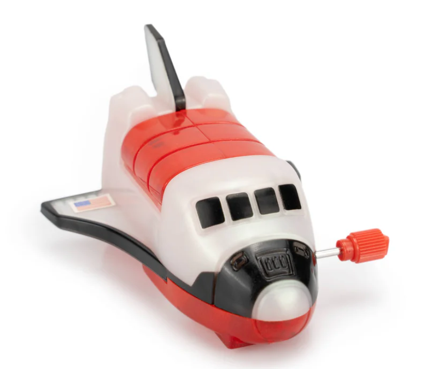 Z Wind Ups | Space Shuttle Moony wind-up toy in red and white with a key on the side for kids' imaginative play.